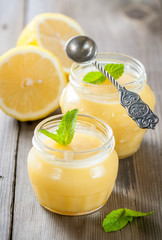 Homemade lemon curd with fresh lemons