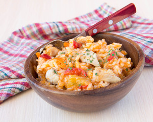 Chicken with rice and vegetables in sour-sweet sauce Chinese sty