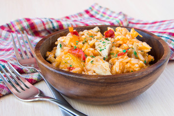 Chicken with rice and vegetables in sour-sweet sauce Chinese sty