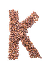 Letter K, alphabet from coffee beans on white background
