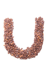 Letter U, alphabet from coffee beans on white background