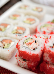 Maki sushi on plate, close-up