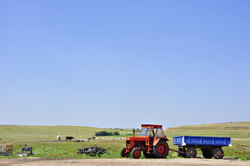 Obraz premium rural landscape with tractor