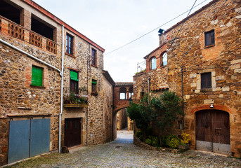 Old street in Catalan village. Pubol