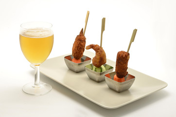 assortment of snacks with beer