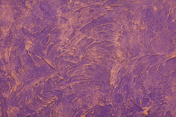 Abstract background of a purple plaster wall