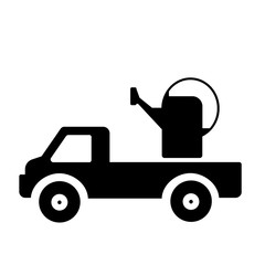 Arrosoir dans une camionnette