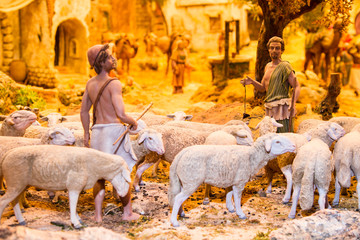 Shepherds with a herd of sheep