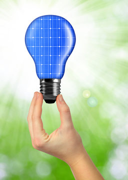 eco energy bulb in hand