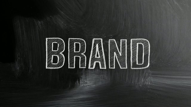 brand concept with white chalk on a blackboard