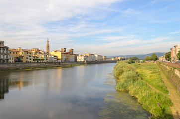 Obraz premium Arno River view with Santa Croce church bell tower