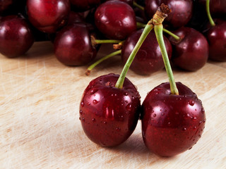 Sweet ripe cherry. Fresh cherries on wooden table.