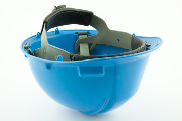 A blue safety helmet upside down