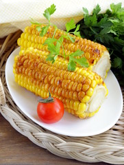 yellow grilled corn , tasty side dish © Olga Kriger
