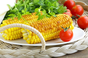 yellow grilled corn , tasty side dish © Olga Kriger