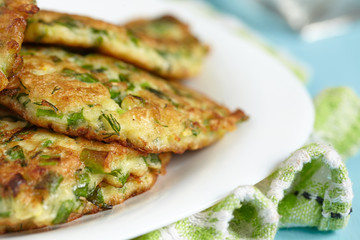 Green pancakes with zucchini and herbs