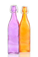 Empty color glass bottles, isolated on white