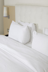 King sized bed in a luxury hotel room