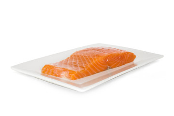 salmon fish on dish with white background