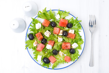 fresh salad with watermelon, feta cheese and olives, horizontal