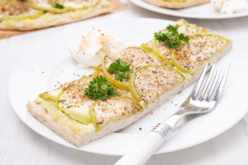 piece of cake with zucchini and yoghurt sauce