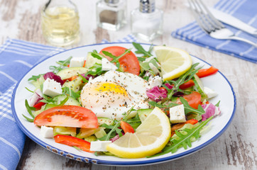 Vegetable salad with poached egg