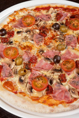 pizza with ham and mushrooms