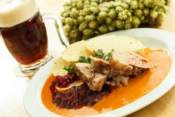 meat with cabbage and mashed potatoes