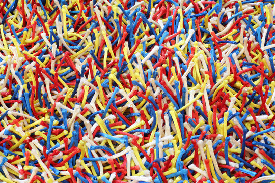 Close-up of surface carpet, made of many small colorful ropes. © Pavel Losevsky