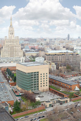 Fototapeta na wymiar Skyscraper on Kudrinskaya Square and New American embassy