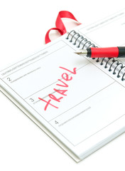 notebook and pen close-up on white background