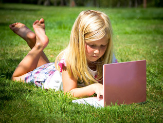 little girl with laptop