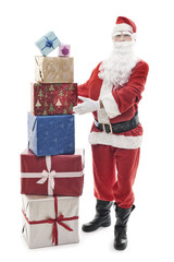 Santa Claus with stacked christmas presents