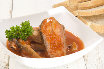 fish soup in a bowl and bread