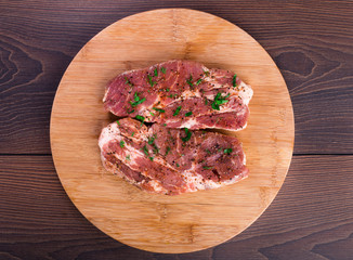 Raw steak with spices