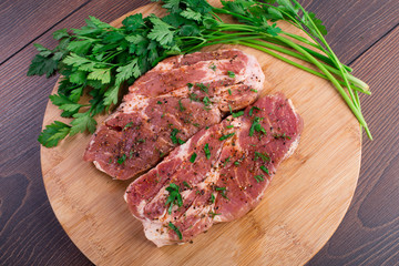 Raw steak with spices