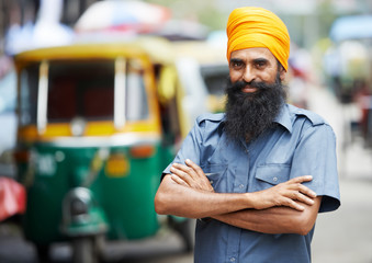 Indian auto rickshaw tut-tuk driver man
