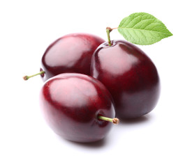 Fresh plums with leaf