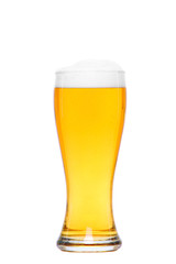 Glass of light beer isolated on white