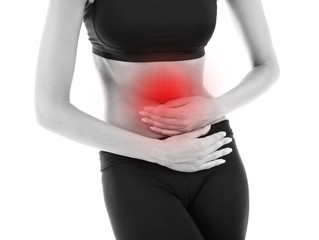 Woman suffering from abdominal pain