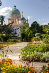 Dome and old town hall in Potsdam behind a flowered park - obrazy, fototapety, plakaty