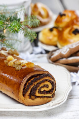 Poppy seed cake in christmas setting. Selective focus