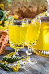 Closeup of liqueur in glass made of honey and lime