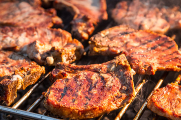 Closeup of steak on grill fire-toasted