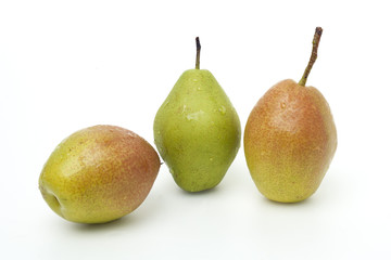 Fototapeta na wymiar Pears with water droplets on white background