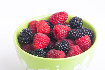 raspberry and blackberry on white isolated background