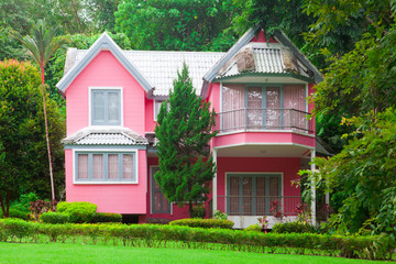 pink house in forest
