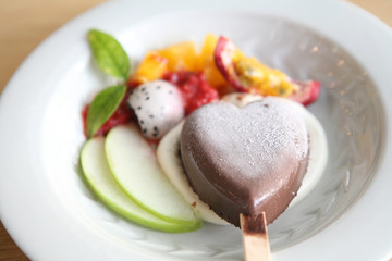 Fruit with chocolate ice cream