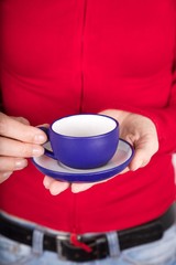coffe blue cup on palm
