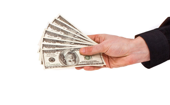 Few bills of U.S. dollars in male hand